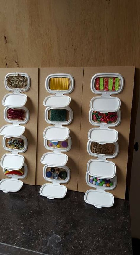 DIY Sensory board ideas to encourage your busy babies and toddlers to explore new textures, objects, and incorporate fine motor skills.