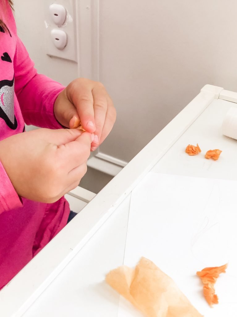 A fall apple activity with FREE PRINTABLES for your toddler to develop fine motor skills using stickers, crayons, or dot markers. Help them to learn colors & counting as well during this activity.