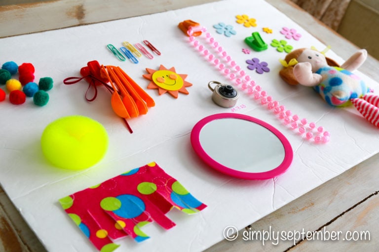 DIY Sensory board ideas to encourage your busy babies and toddlers to explore new textures, objects, and incorporate fine motor skills.