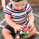 PomPom Whisk: A Baby Fine Motor Activity