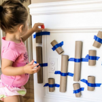 Pom Pom Tube Drop: Toddler Developmental Activity