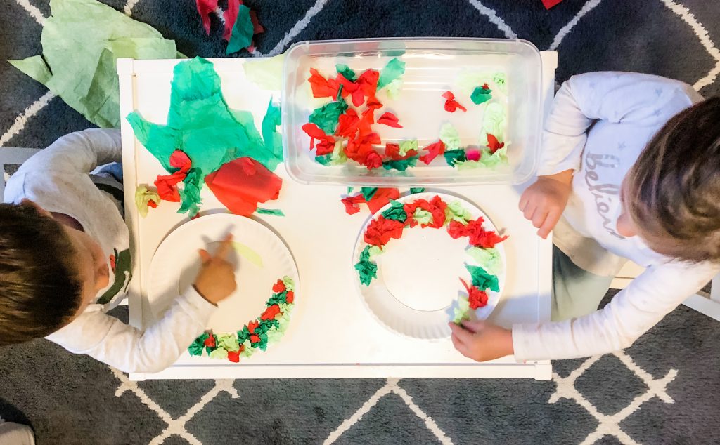 Toddlers and Preschoolers will love this fun tissue paper Christmas activity. Help them build fine motor skills, math and language skils