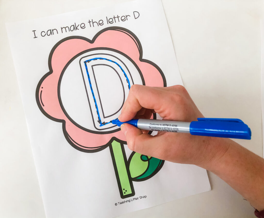 Help your preschooler practice letter formation with this spring flower free printable. Use sensory materials to write, draw, & trace letters