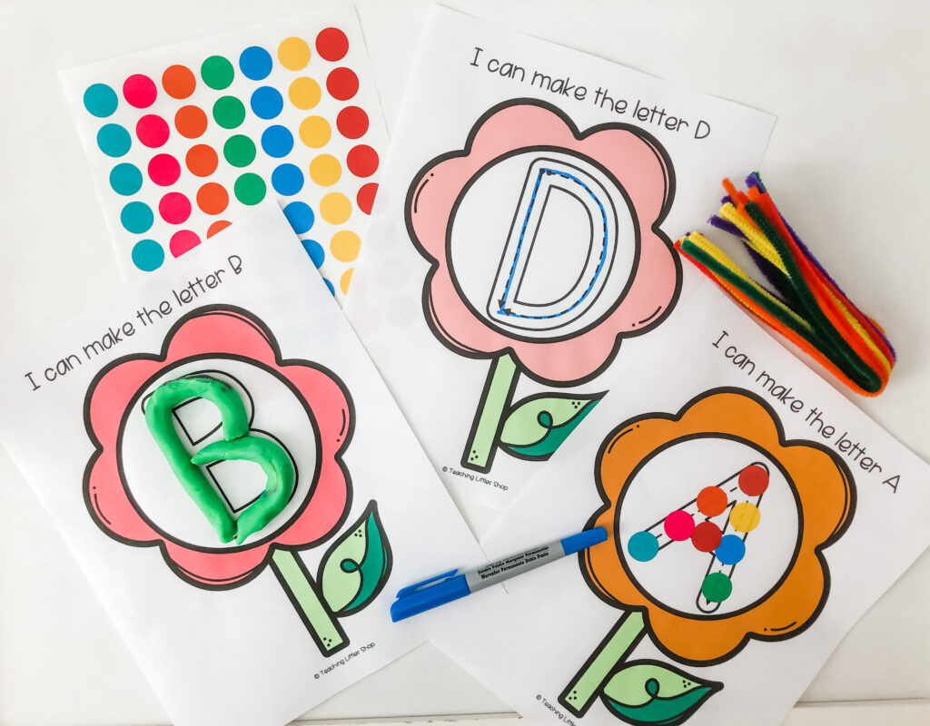 Help your preschooler practice letter formation with this spring flower free printable. Use sensory materials to write, draw, & trace letters
