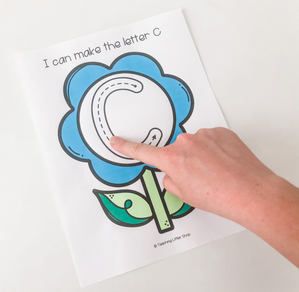 Help your preschooler practice letter formation with this spring flower free printable. Use sensory materials to write, draw, & trace letters