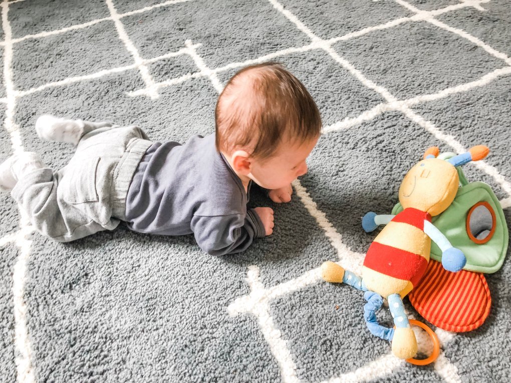 Are you trying to get your baby to crawl? Follow these easy tips and fun activities to get your infant to hit that milestone and get moving.
