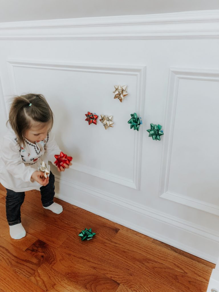 A simple and cheap Christmas or holiday activity to do with your babies and toddlers to teach them colors, actions words, and just have fun